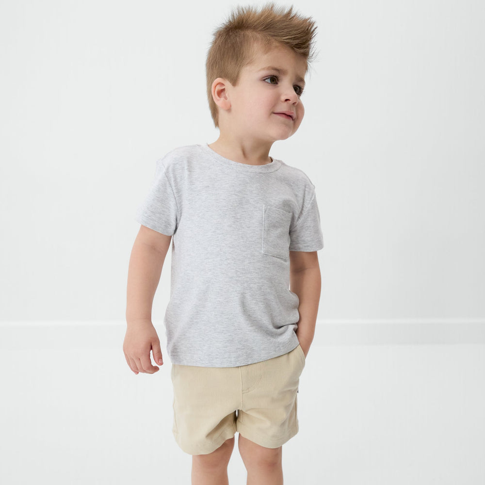 Child wearing a Light Heather Gray bamboo tee