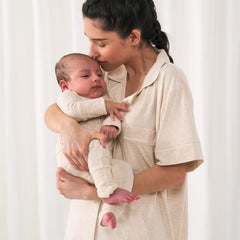 image of a woman wearing a Heather Oatmeal women's pj set matching her baby