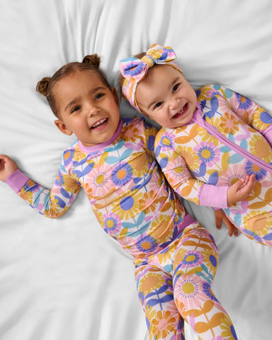 Two children wearing Petal Power foral PJs