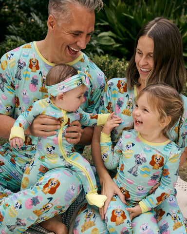 Family of four wearing Disney Easter Pajamas