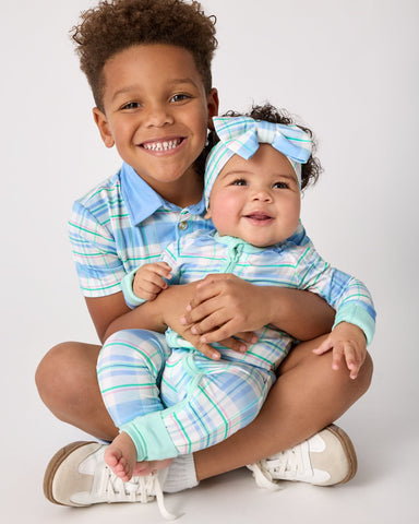 Two children wearing matching Springtime Plaid styles