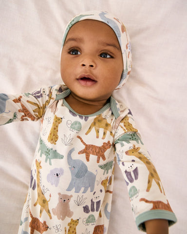 Baby wearing Safari animal themed newborn clothing