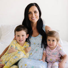 Elephant Snuggles collection in yellow, blue, and pink colorways for styles in women's and children's.