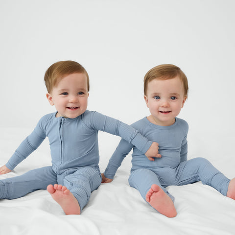 two children wearing match fog ribbed pajamas