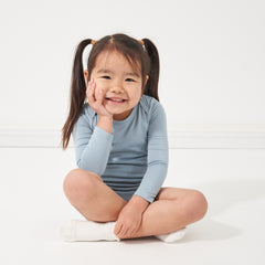 child wearing a Fog bodysuit