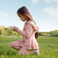 child wearing mauve blush peplum hoodie and matching leggings