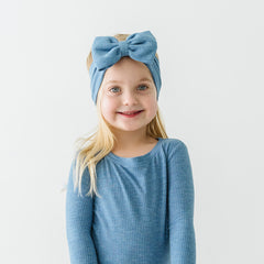child wearing a spelling with sesame street luxe bow headband