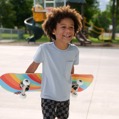 Child wearing a Fog pocket tee and Monochromatic Check Shorts