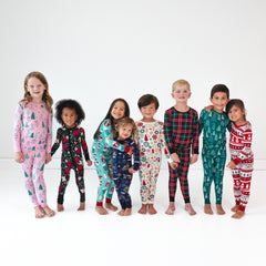 children wearing various 2024 Little Sleepies Holiday Collection pajamas