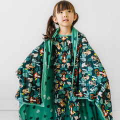 child in monkeying around pajamas with matching triple layer cloud blanket