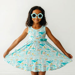 Girl in sunglasses posing in Ocean Pals Sleeveless Twirl Dress 