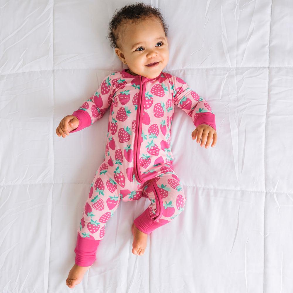 Child wearing a Sweet Strawberries zippy