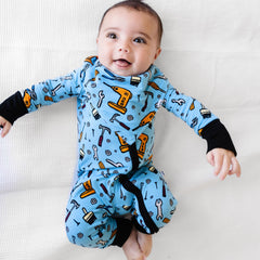 child in tool kit pajama zippy with matching bandana bib