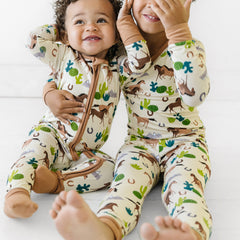 children matching in wild horses printed pajamas