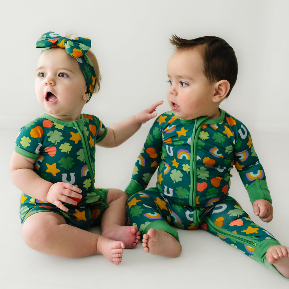 Child in Lucky printed pajamas with matching Cloud Blanket