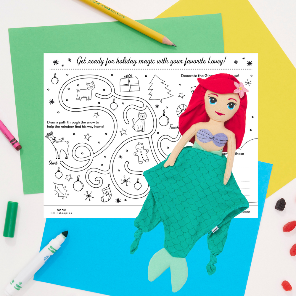 Flat lay image of Ariel and a Free Printable Coloring Sheet