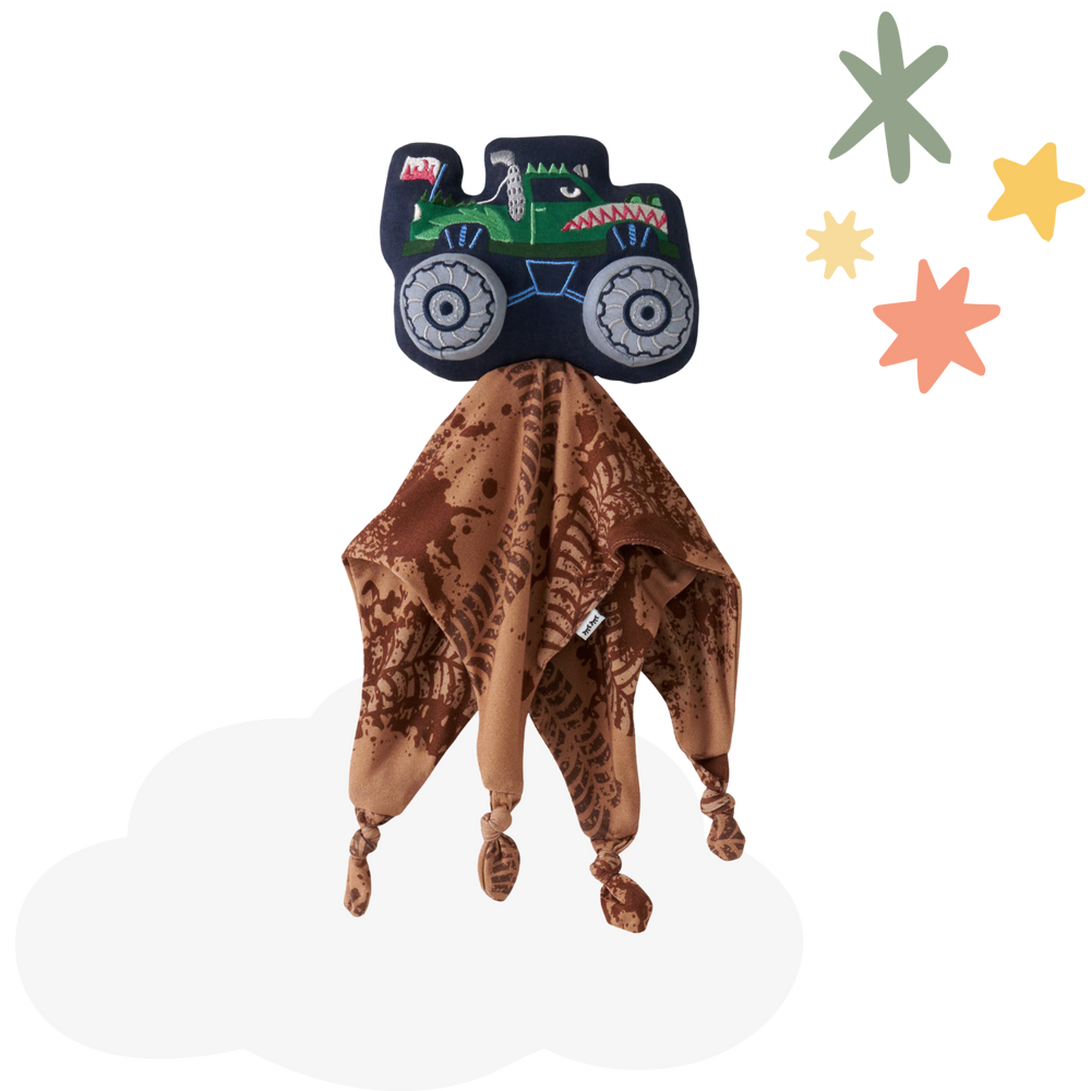 Flat lay of Max the Monster Truck Sleepyhead Lovey