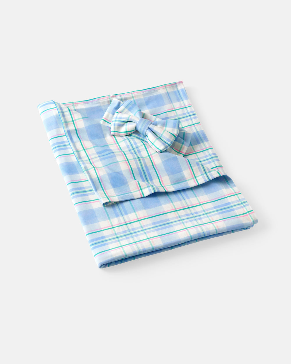 Flat lay of the Springtime Plaid Swaddle & Luxe Bow Headband Set