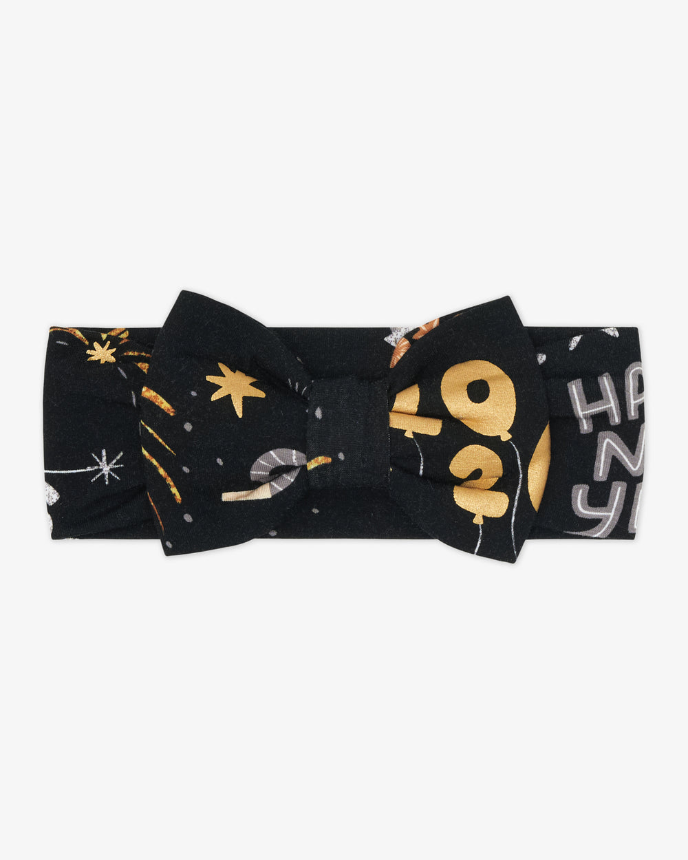 Flat lay of the Cozy Countdown Luxe Bow Headband