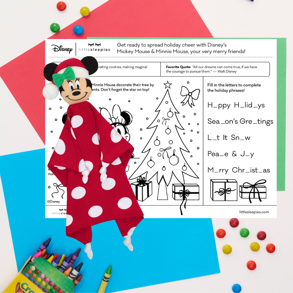 Flat lay image of a Minnie Mouse Lovey with a free minnie printable coloring sheet