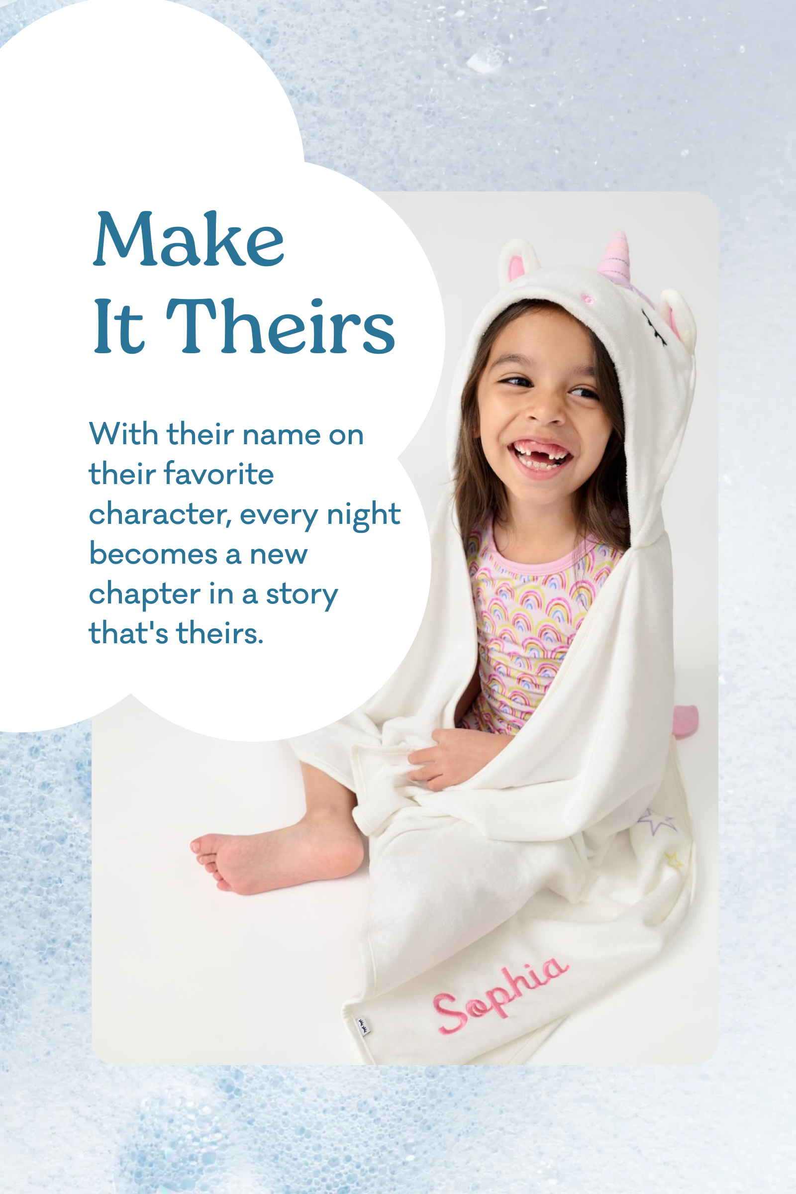 Personalized baby hooded blanket or wrap featuring a smiling young girl wrapped in a white blanket with pink unicorn ears and the name 'Sophia' on the corner. The image is styled as a marketing card with the text 'Make It Theirs. With their name on their favorite character, every night becomes a new chapter in a story that's theirs.'