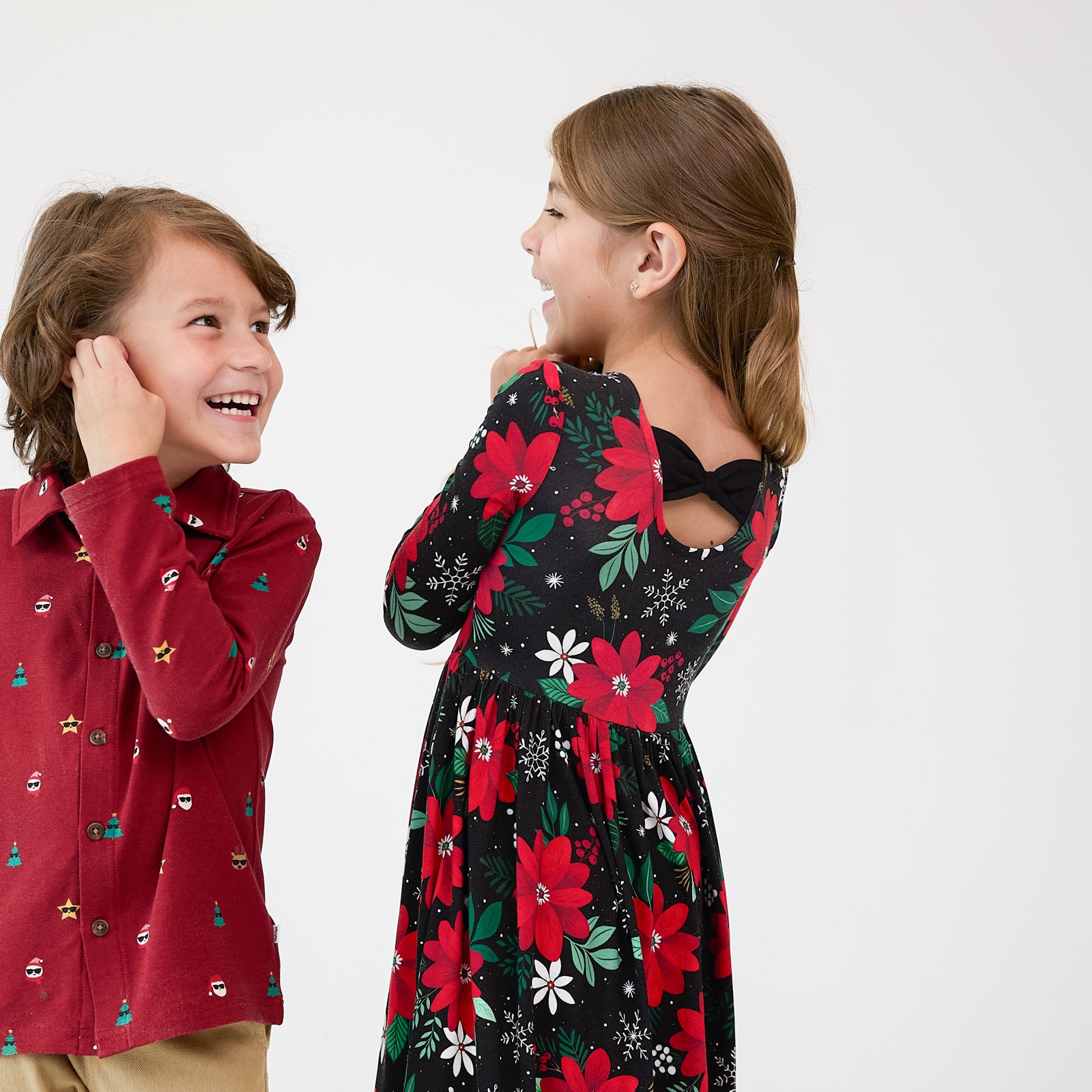 Two children wearing coordinating Holiday Play styles