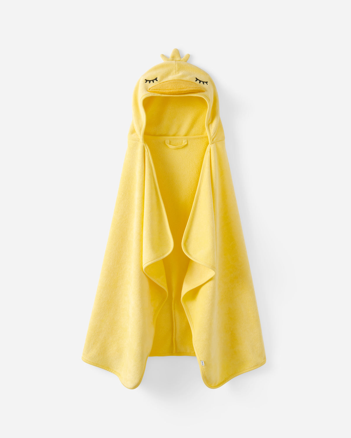 A bright yellow plush hooded towel or bathrobe with a duck-face hood and small crown detail, shown hanging against a light gray background.