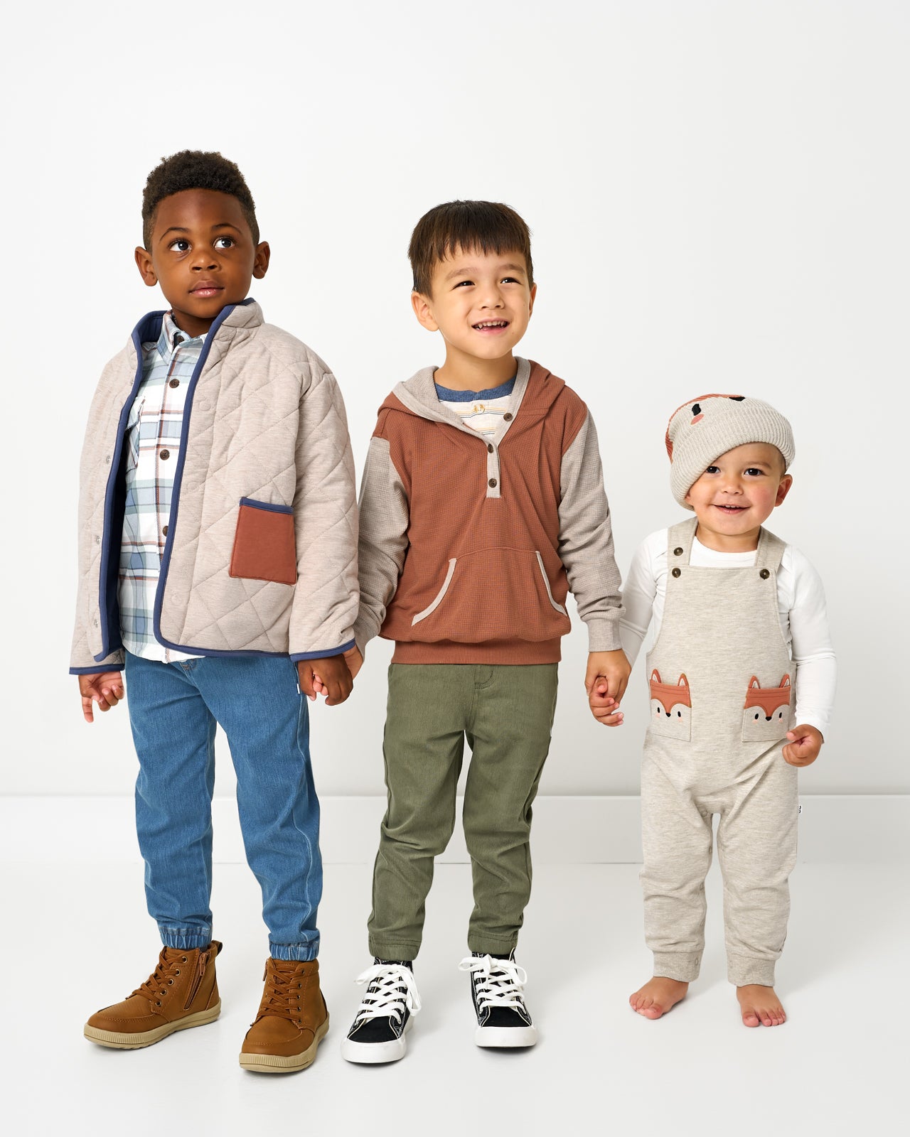 Three kids wearing styles from the Fall Capsule