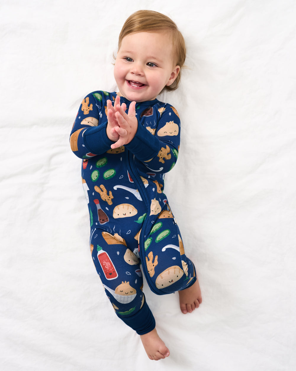 Aerial view of baby wearing the Bao Buddies Zippy