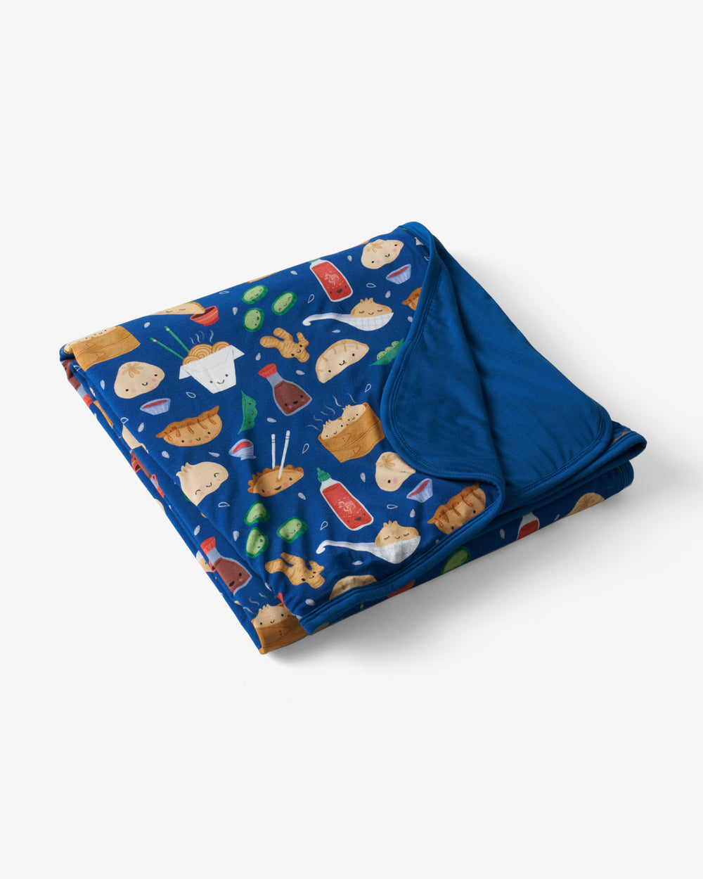 Flat lay of the Bao Buddies Large Cloud Blanket®