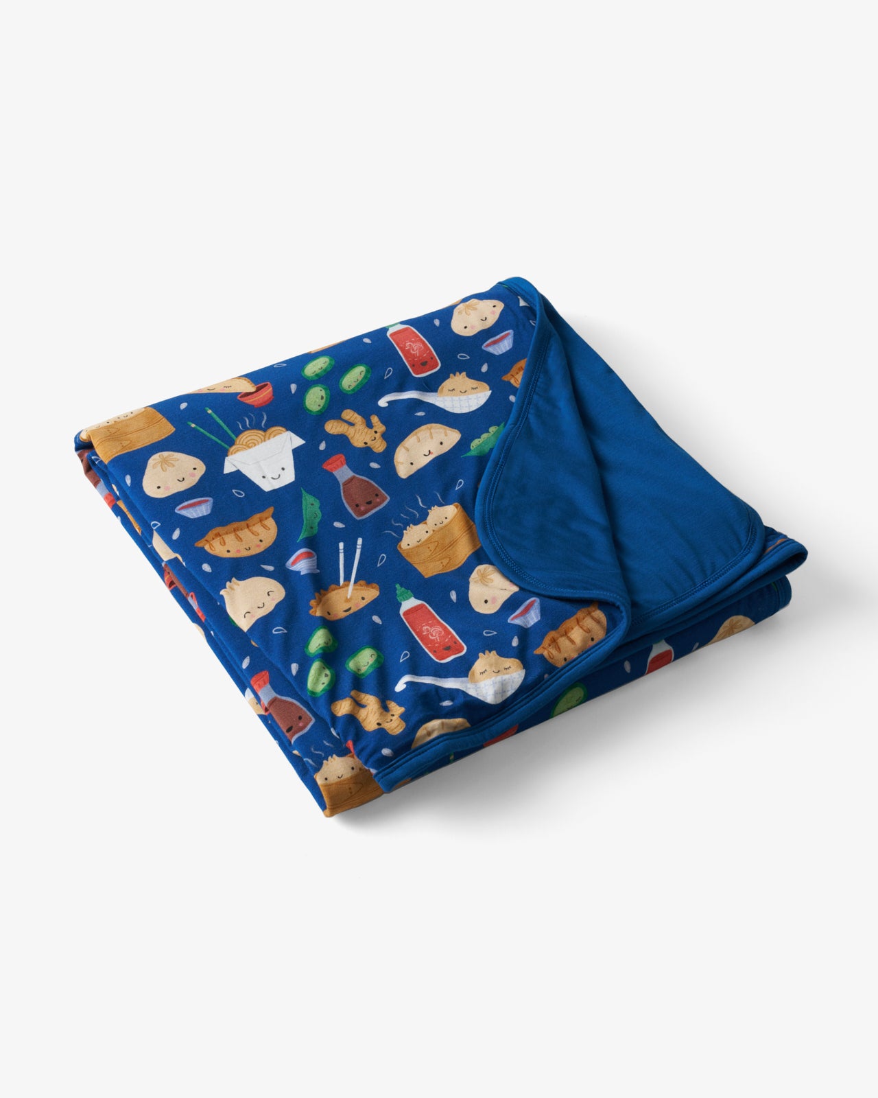 Flat lay of the Bao Buddies Large Cloud Blanket®