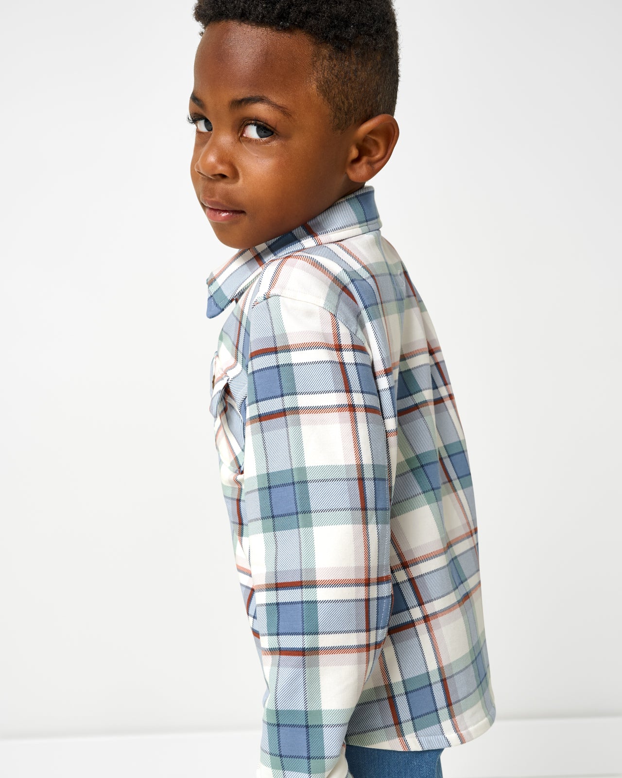Side view of boy wearing the Blue Ridge Plaid Shacket