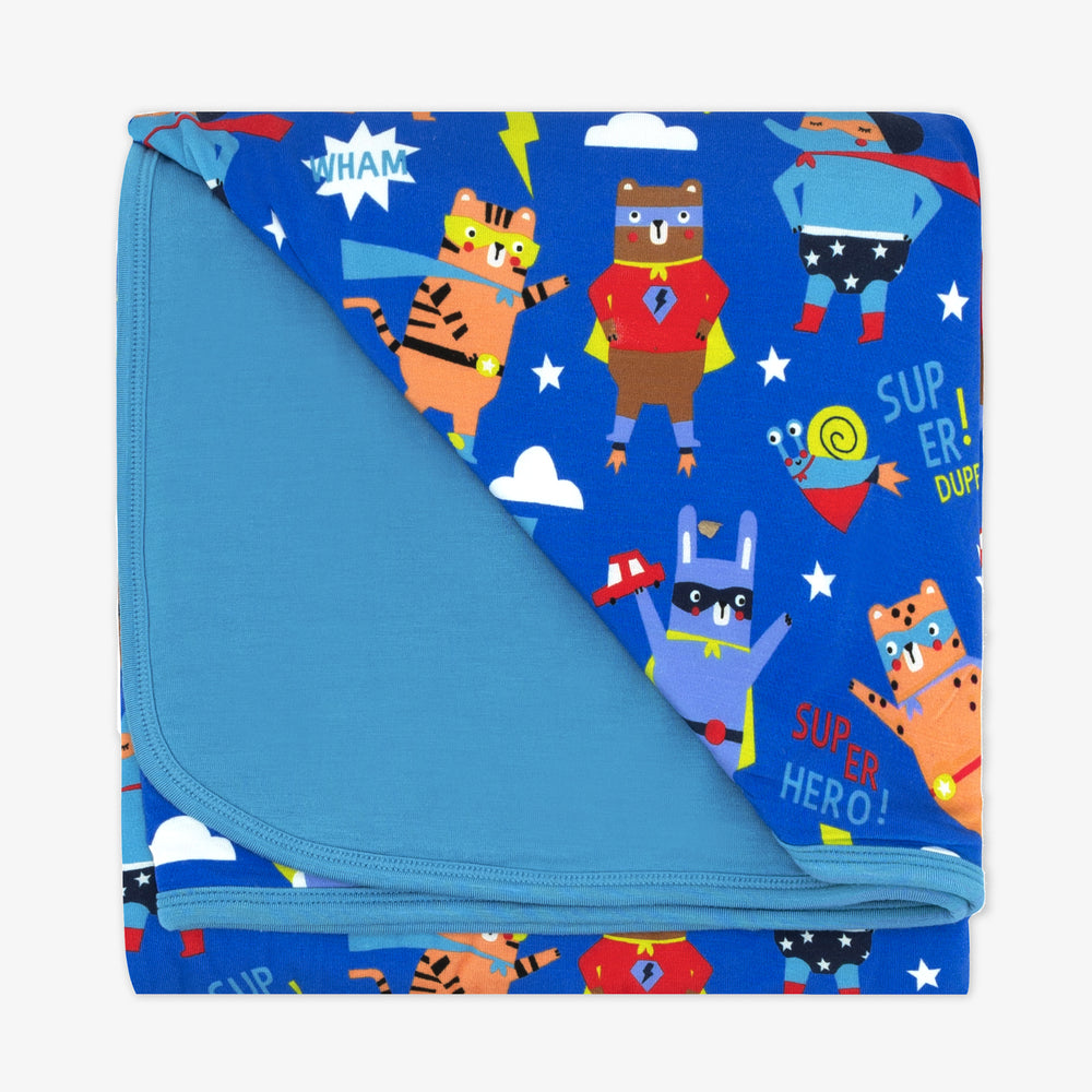 Flay lay of the Blue Sleepy Heroes Cloud Blanket