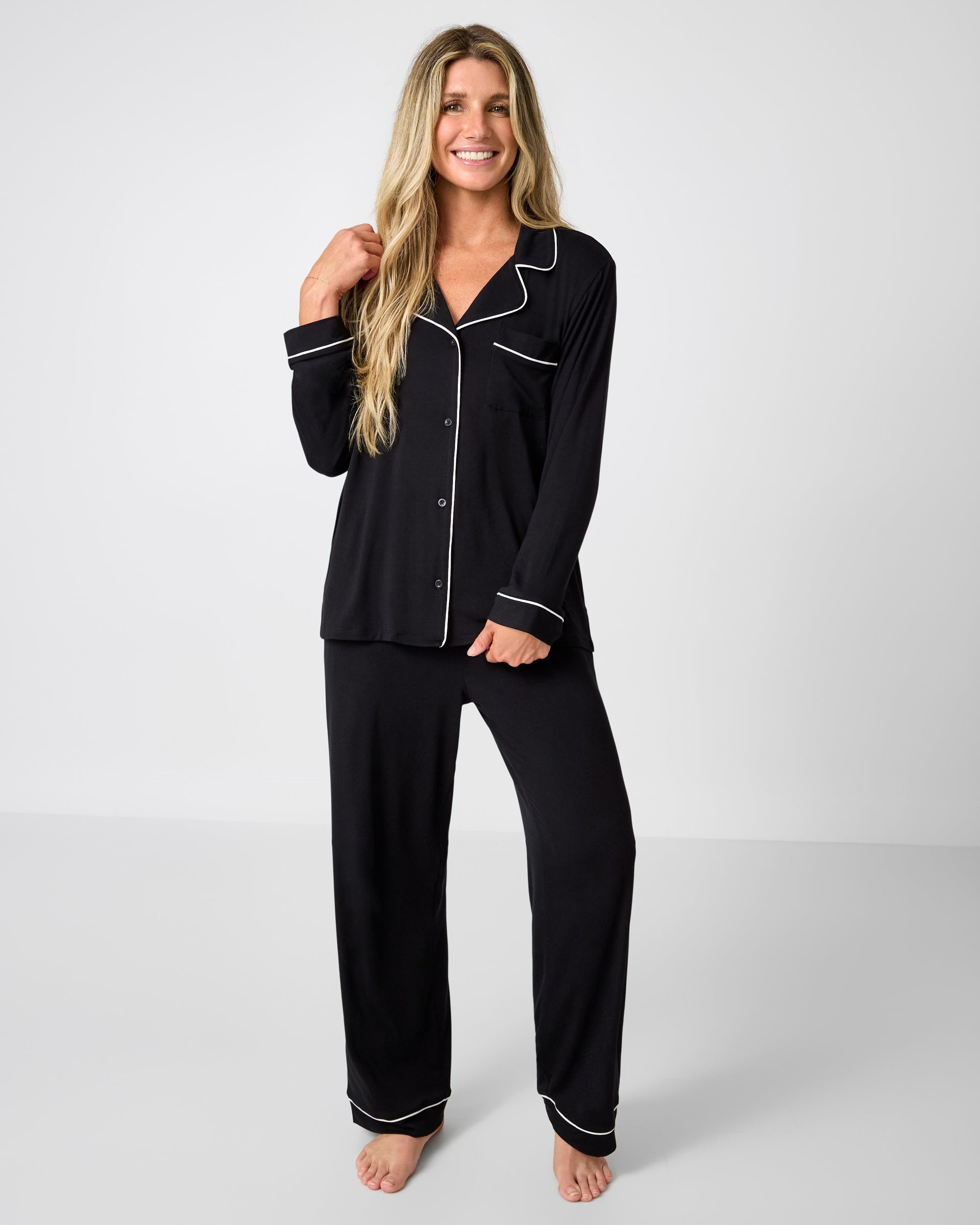 Woman wearing the Black Women's Long Sleeve Pajama Set