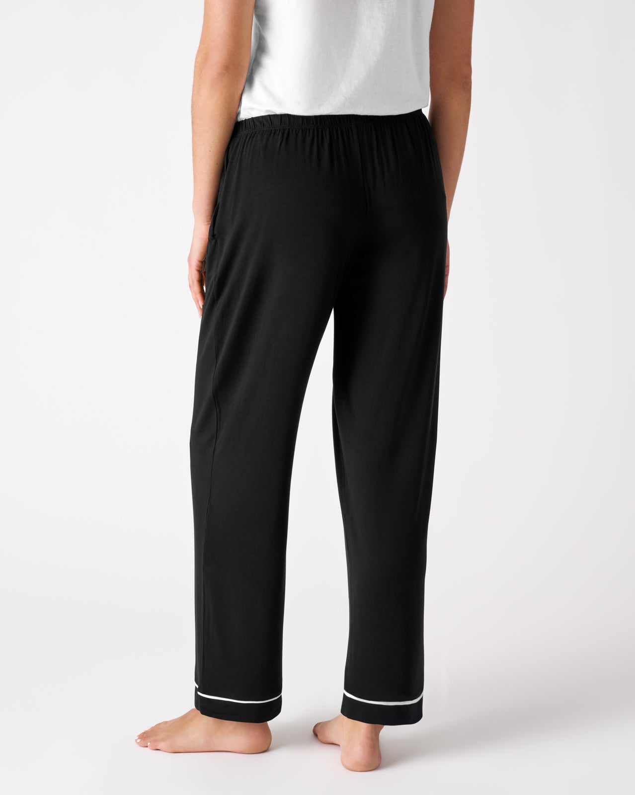 Back view of woman wearing the Black Women's Pajama Pants 