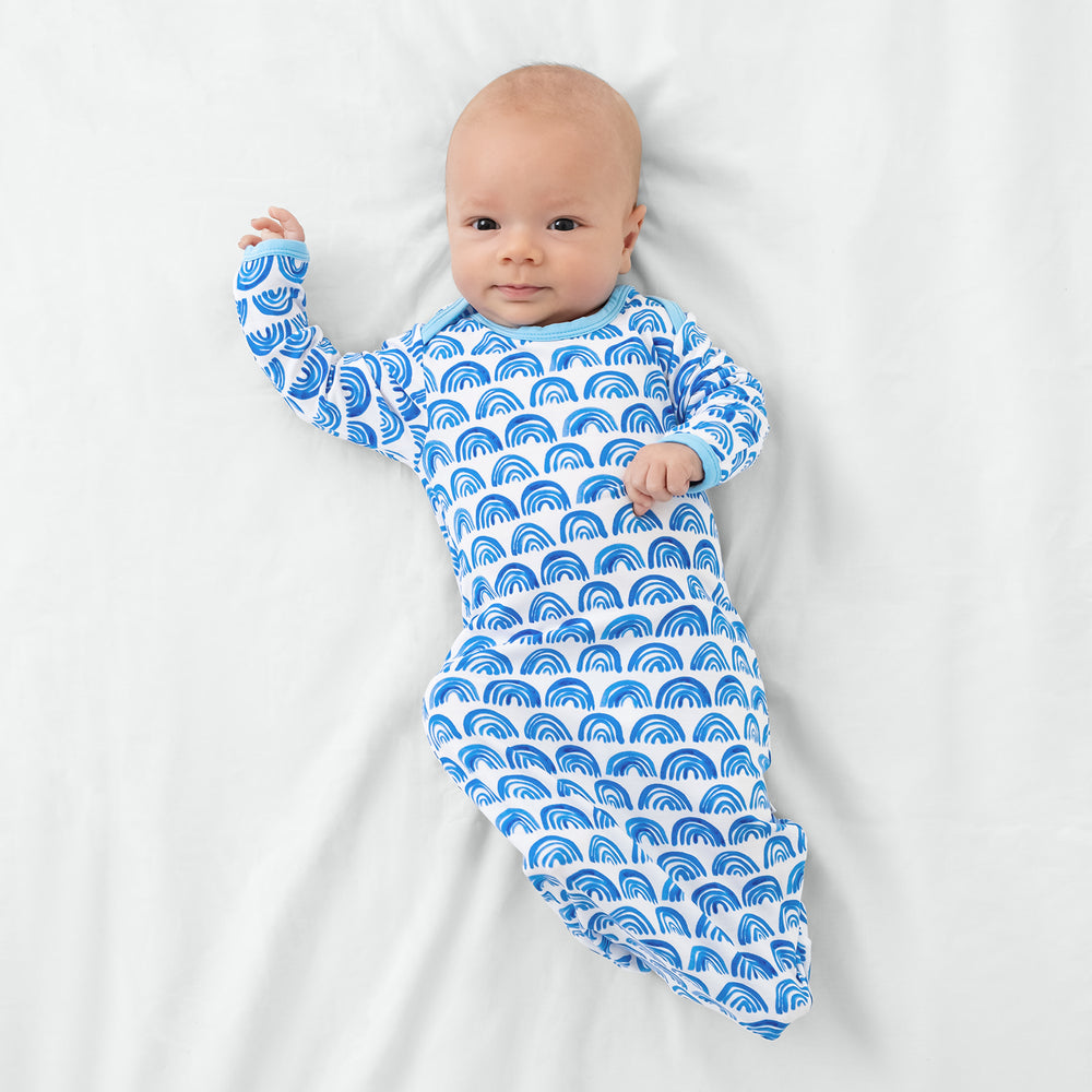 Aerial view of child in the Blue Rainbows Infant Gown