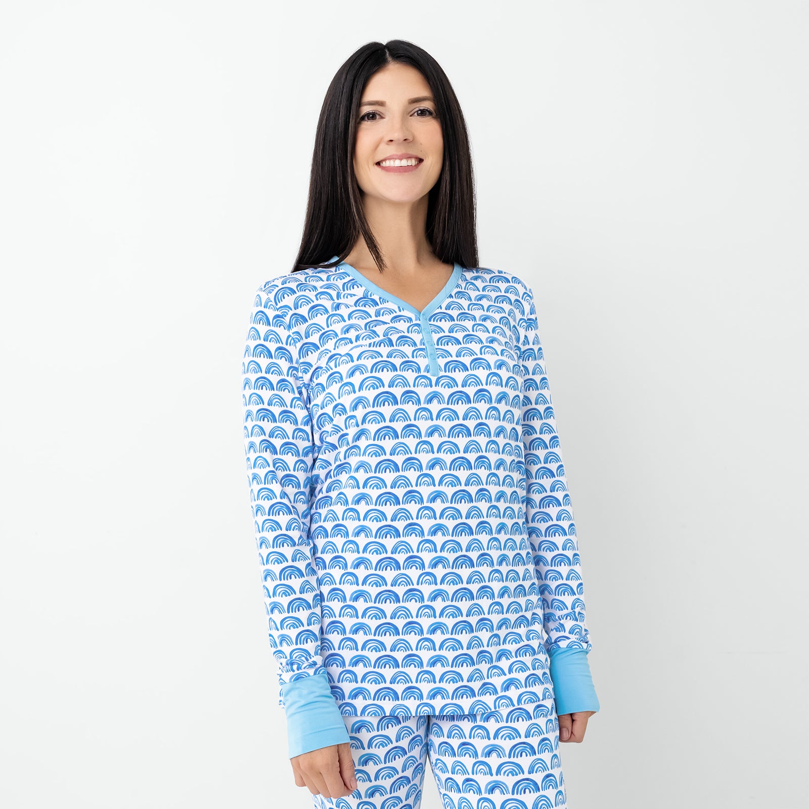 Standing woman wearing the Blue Rainbows Women's Pajama Top