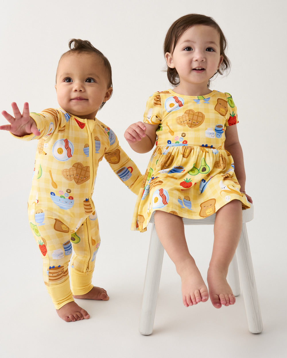 Two children wearing matching Breakfast Bunch styles