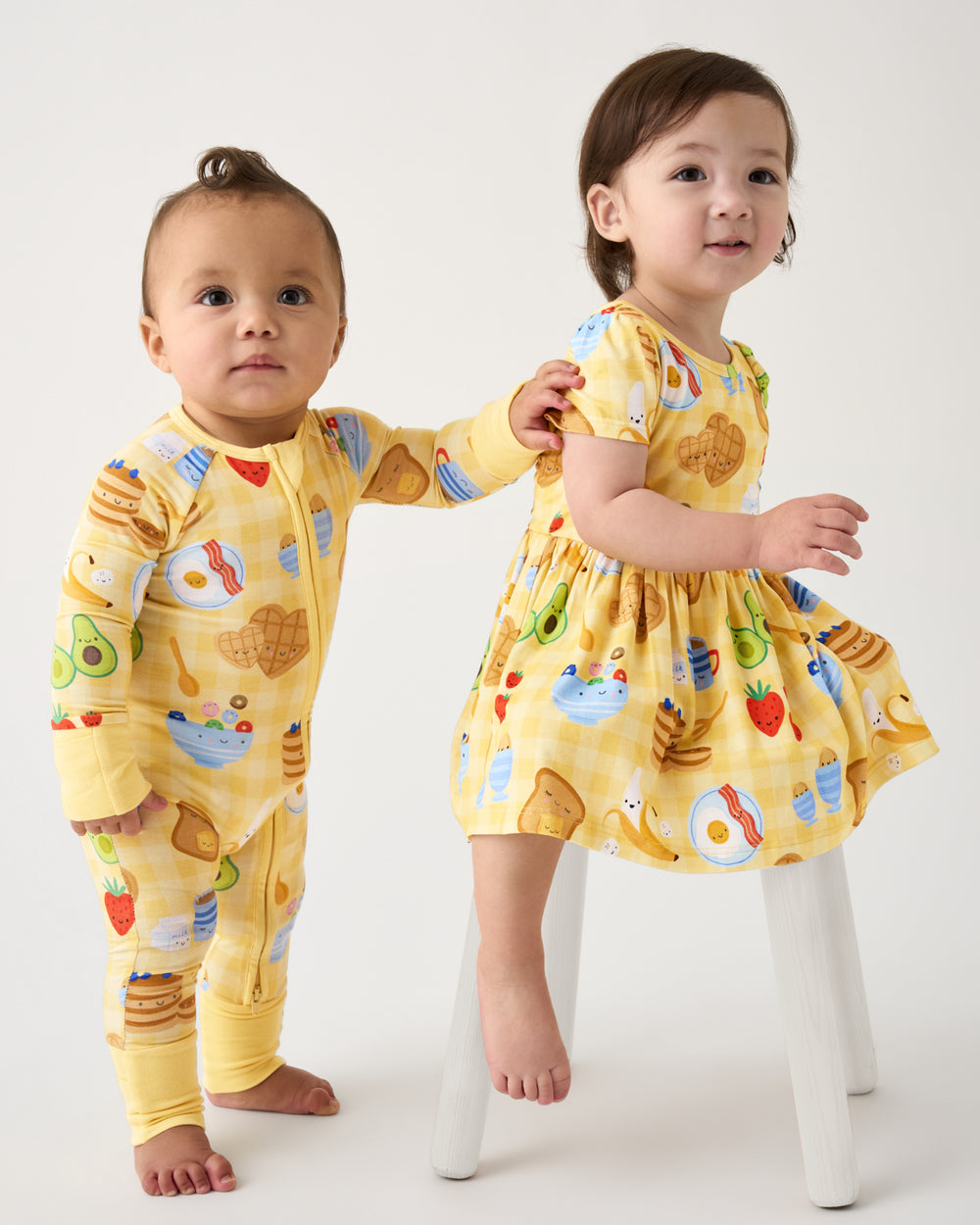 Two kids wearing matching Breakfast Bunch styles