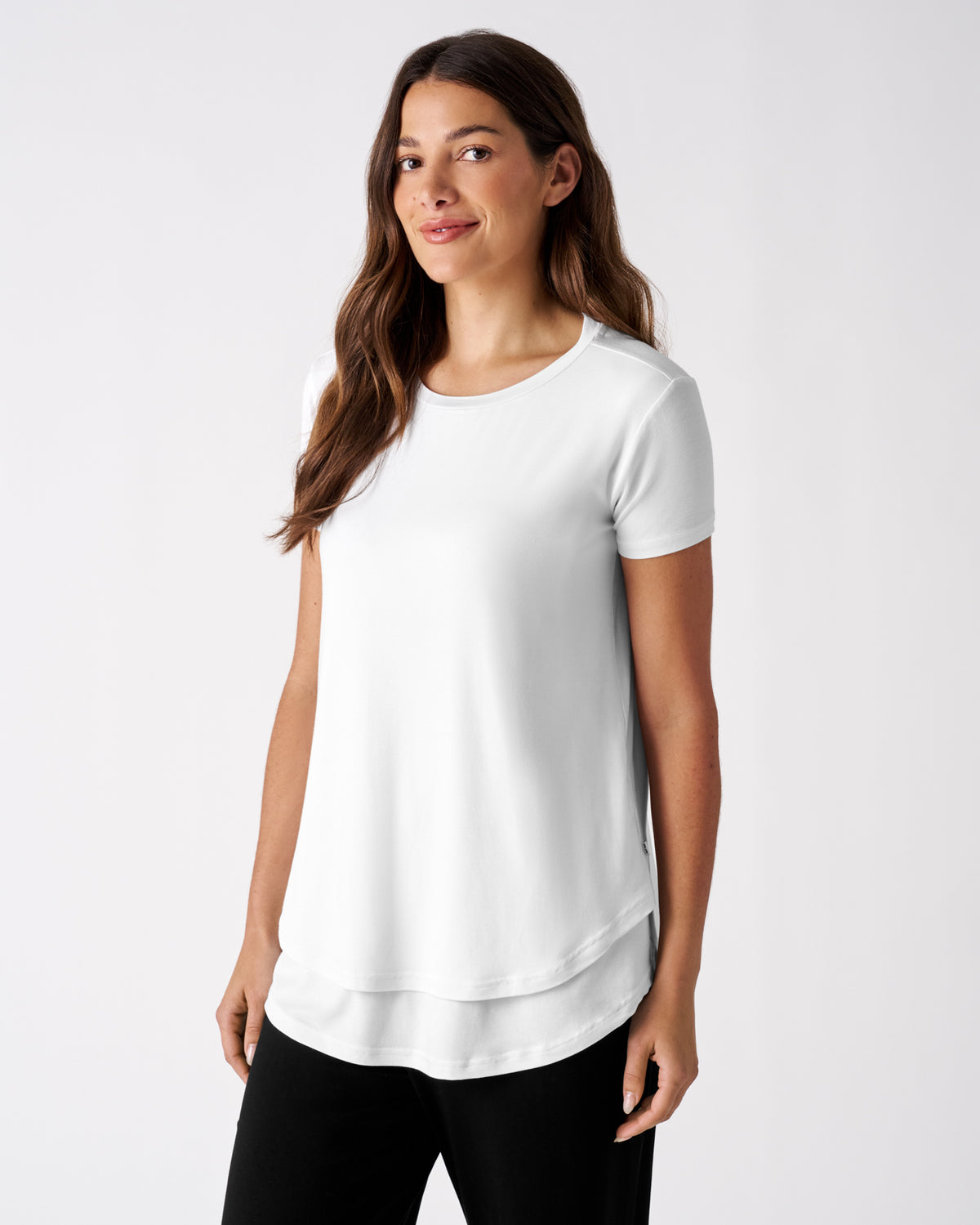 Woman wearing the Bright White Women's Nursing Top