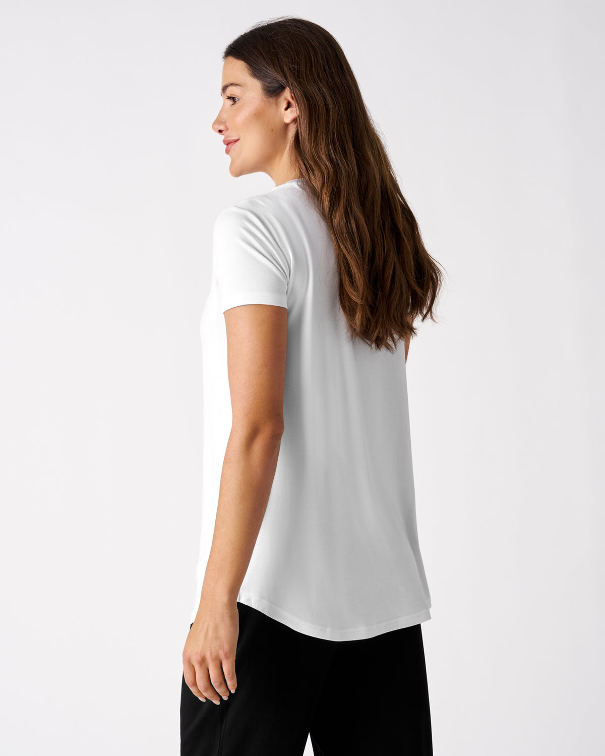 Back view of woman wearing the Bright White Women's Nursing Top