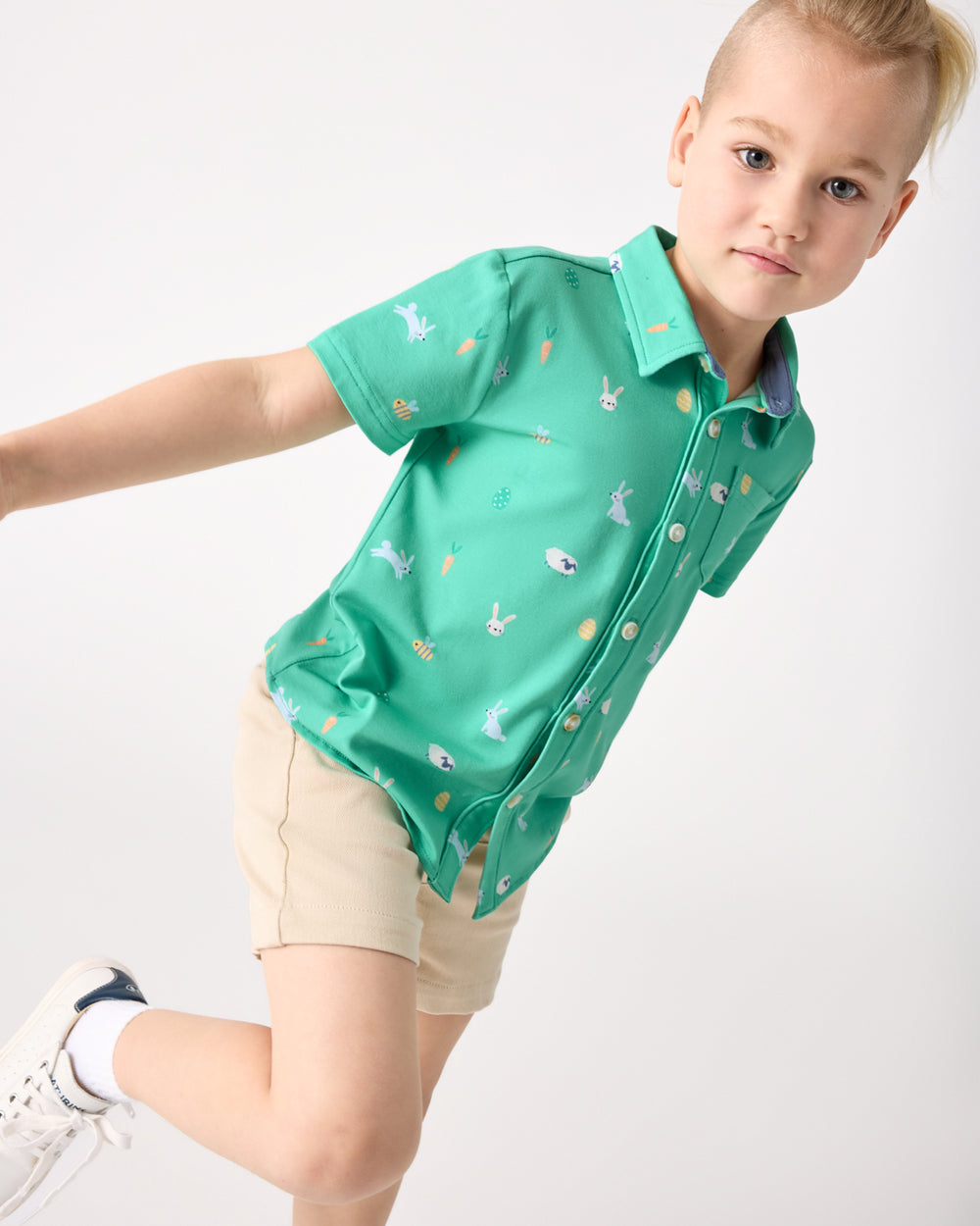 Child in motion wearing the Bunny Burrow Button Down Polo