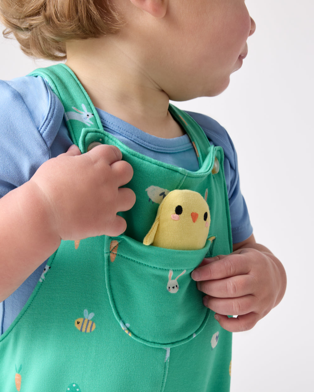 Close up of the pocket detail on the Bunny Burrow Shorty Overall Set