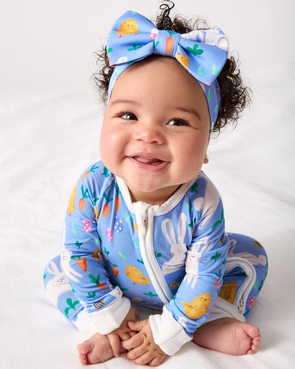 Baby wearing the Bunny Patch Luxe Bow Headband