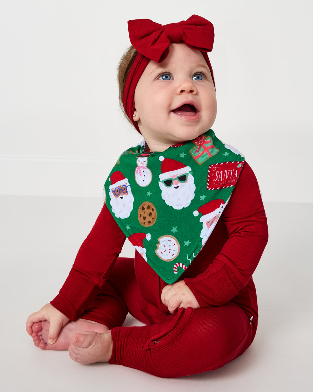 Baby wearing the Cookies for Santa Bandana Bib