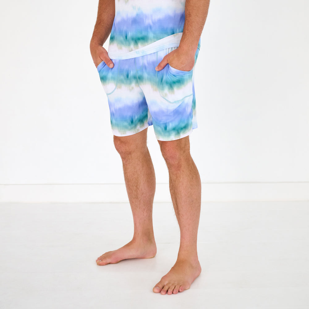 Man wearing the Blue Cosmic Mist Men's Pajama Shorts