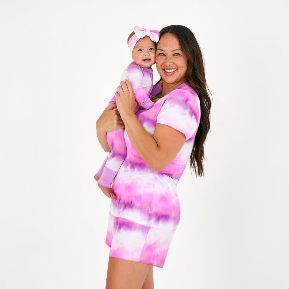 Mother and daughter wearing matching Pink Cosmic Mist bamboo pajamas
