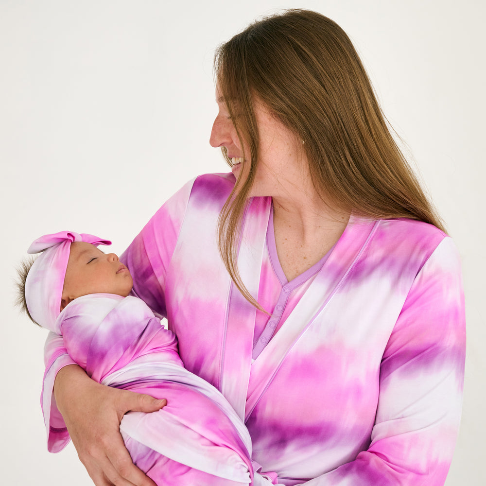 Mother and child wearing matching Pink Cosmic Mist bamboo pajamas
