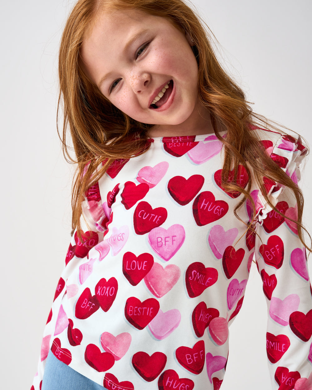 Close up of girl wearing the Candy Cuties Flutter Tee