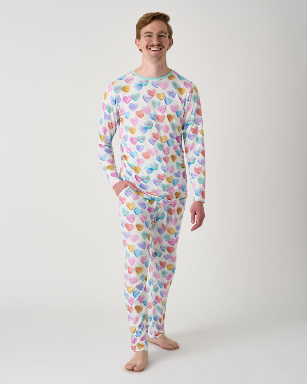 Front view of man wearing the Candy Cuties Men's Long Sleeve Pajama Top and Pants